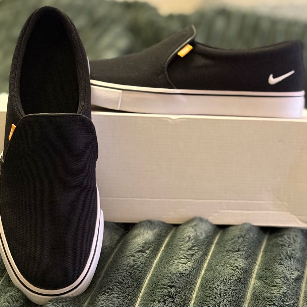 Nike Black and White Slip-On Sneakers